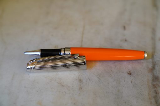 STYLO ROLLER CARAN D'ACHE LEMAN DOUE RESINE ORANGE - CAPUCHON METAL PALLADIE