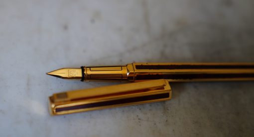 STYLO PLUME CARAN D'ACHE LAQUE BRUNE LIGNEE & PL. OR - PLUME OR MASSIF 18 CARATS