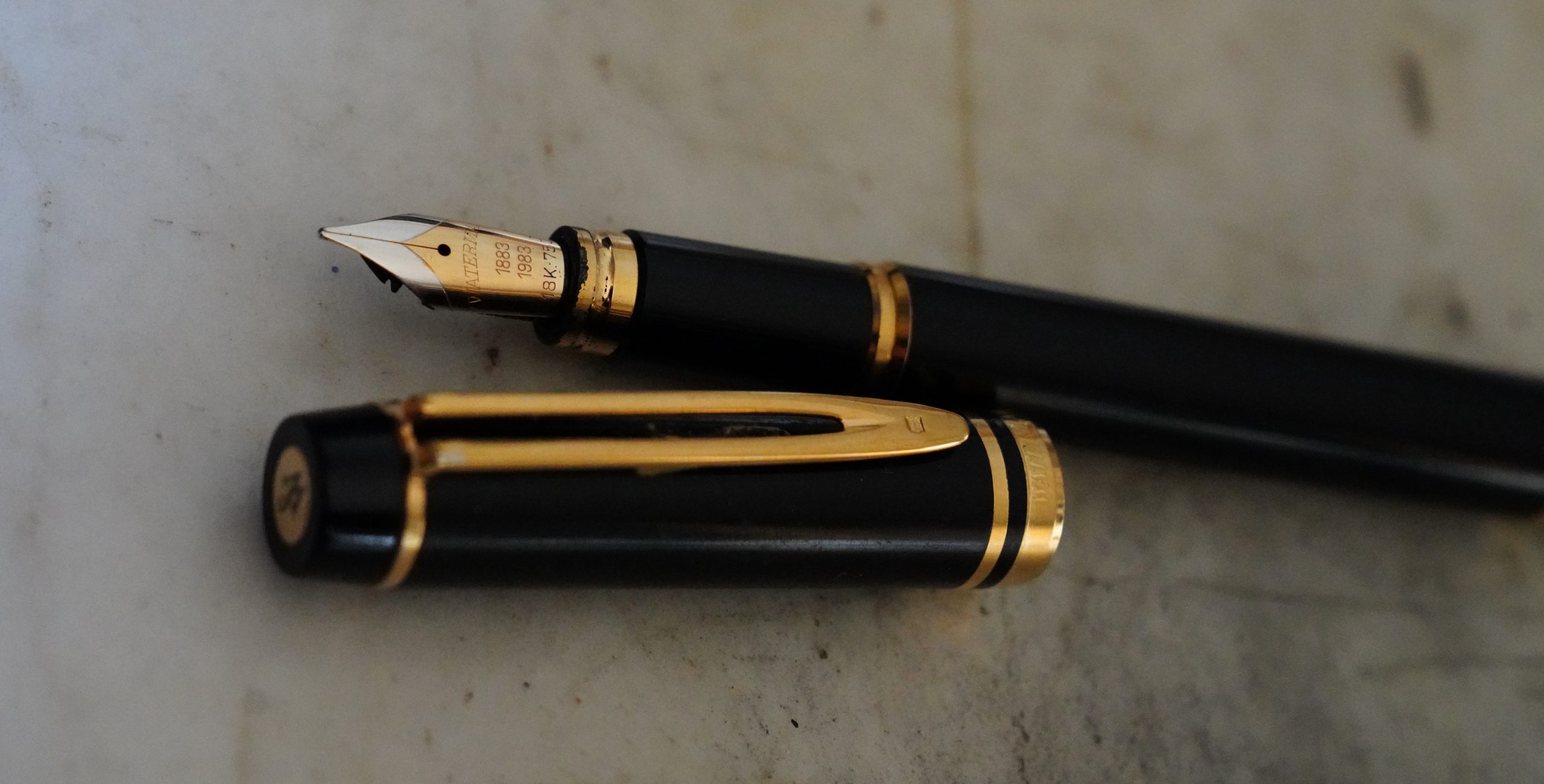 STYLO PLUME WATERMAN MAN 100 RESINE NOIRE - PLUME OR MASSIF 18 CARATS - 1883 - 1983