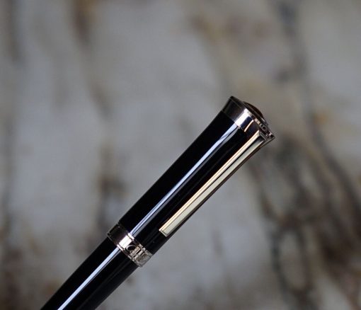 Stylo bille Cartier art deco en résine noire - cabochon rouge irise