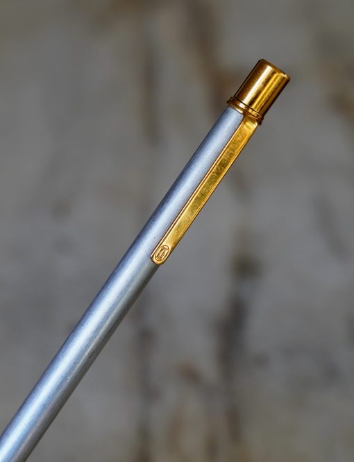 STYLO BILLE CARTIER MUST EN METAL BROSSE & PL. OR 18 CARATS