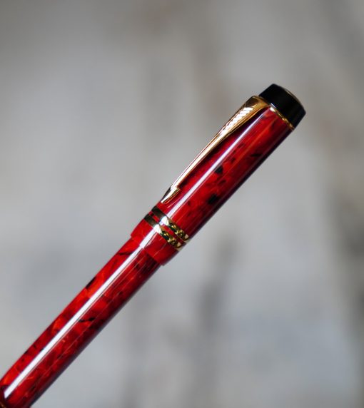 STYLO ROLLER PARKER DUOFOLD RESINE ROUGE MARBREE & PL. OR 18 CARATS