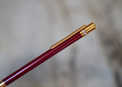 STYLO BILLE MUST CARTIER TRINITY LAQUE BORDEAUX & PL. OR 18 CARATS